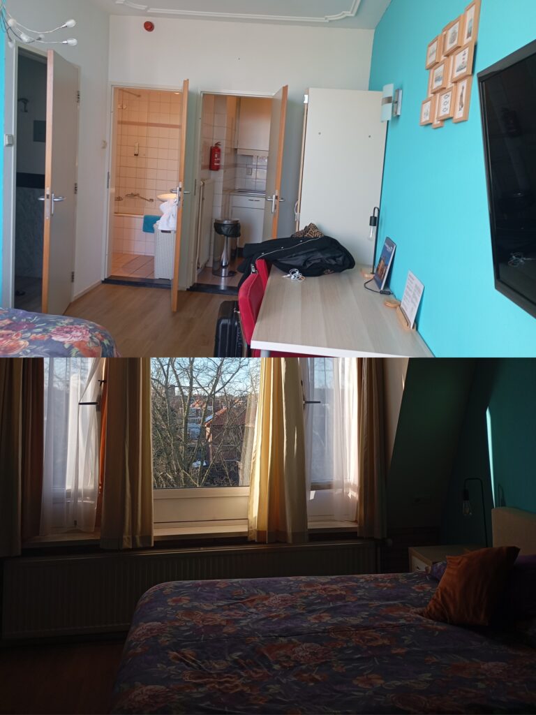Studio-Zimmer im Hotel Plato Scheveningen by Hofstad Studios mit Bett, Arbeitsplatz, Küche und Badezimmer